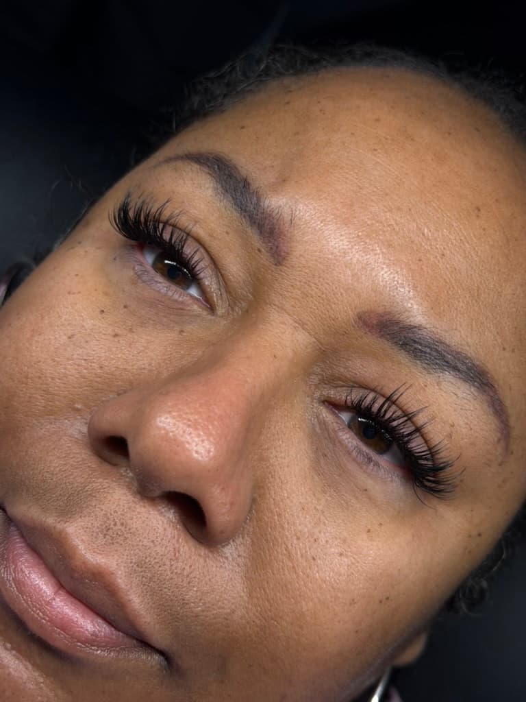 Portrait showcasing classic lash extensions and groomed brows
